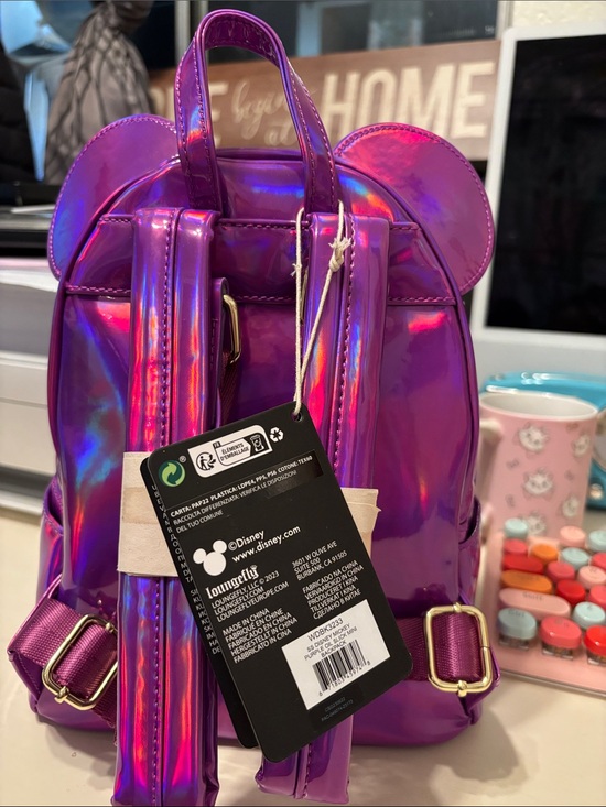 halographic mini backpack Small Pink Hologram Leave behind that bulky backpack from your middle school daze and strap on this Mini Hipster Fashionista Backpack Loungefly Holographic Purple Pink Mini